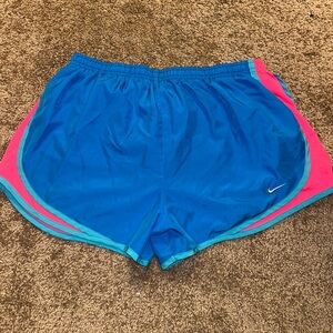 Nike Blue and Pink Athletic Shorts with Curved Hem